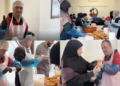 Young volunteer with Down syndrome helps feed displaced families in Beirut