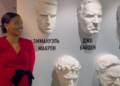 Candace Owens poses with busts including France’s Macron at SPIEF amid ongoing defamation suit