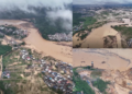 Drone view of devastation – Brown floodwater roars through damaged dam after China’s Guangxi hit by heavy rain
