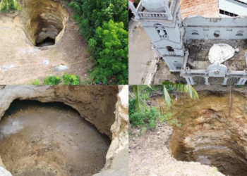Filipinos reel as massive sinkhole SWALLOWS ground, trees in Bogo City