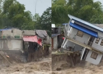 Two-storey residential building in Pampanga, Philippines crumbles as floodwaters sweep it away