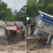 Two-storey residential building in Pampanga, Philippines crumbles as floodwaters sweep it away